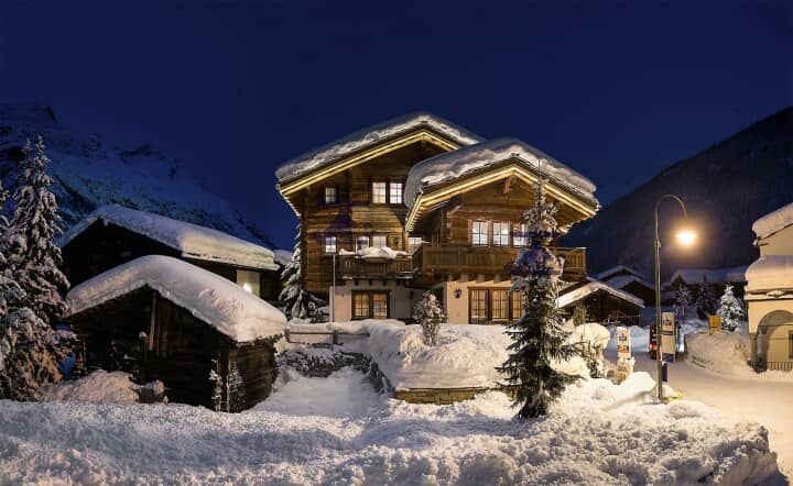 Ski-in/ski-out chalet with timber facade and multiple private balconies