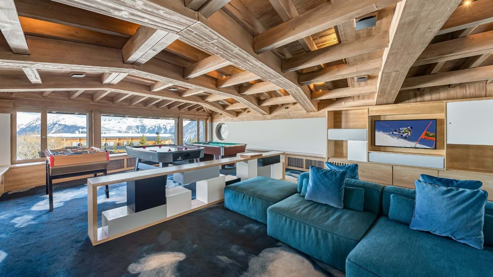 Game room with pool, air hockey, and foosball tables; mountain views