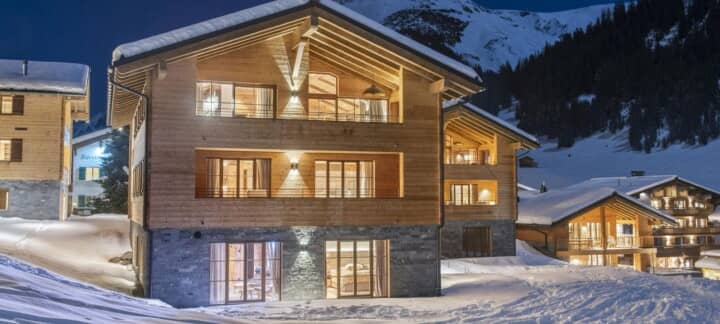 Ski-in, ski-out timber chalet with private balconies and mountain views