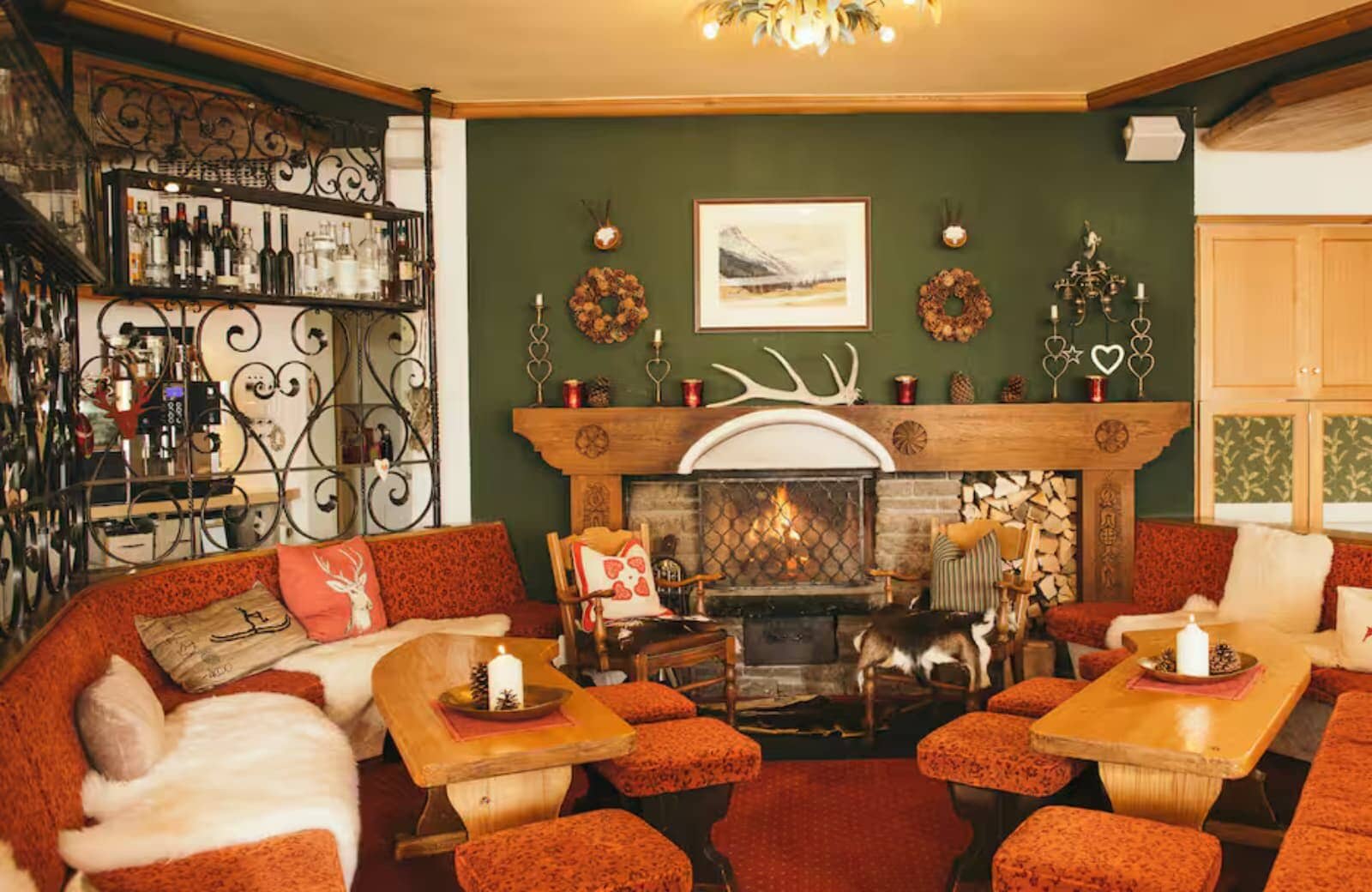 Lounge area with wood-burning fireplace and walk-in wet bar