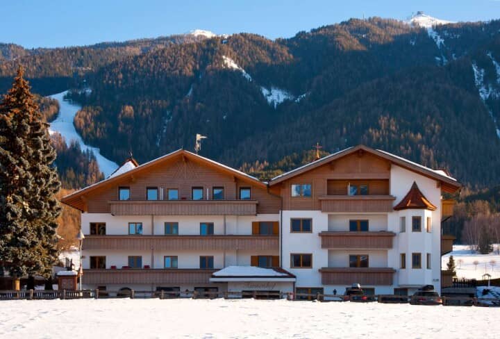 Chalet exterior with private balconies and direct view of ski slopes