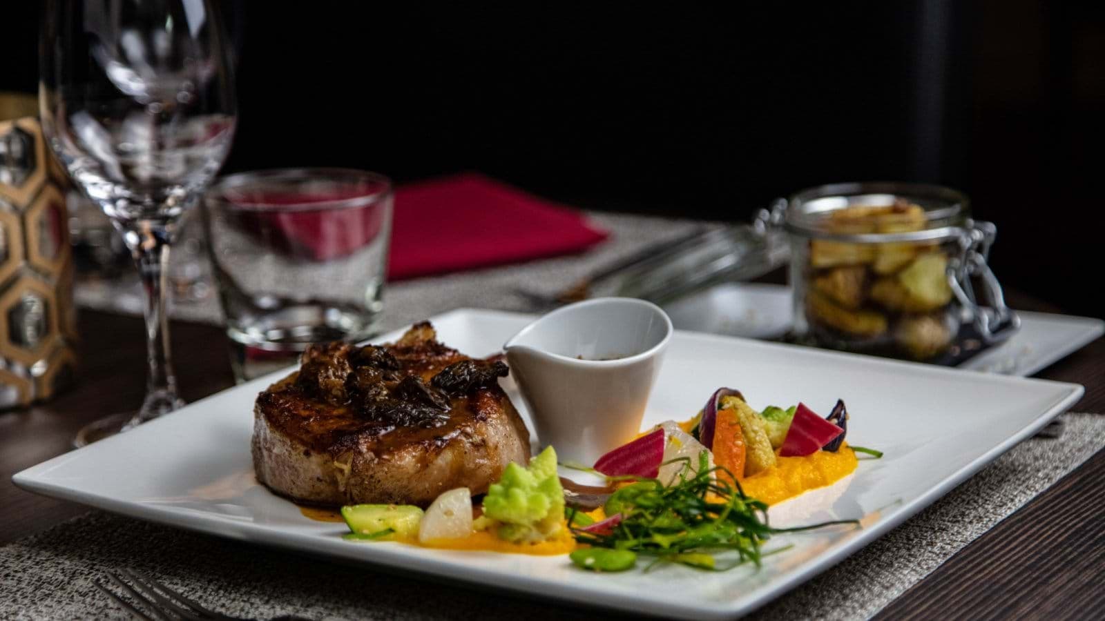 Plated dinner service showcasing local ingredients in the on-site restaurant