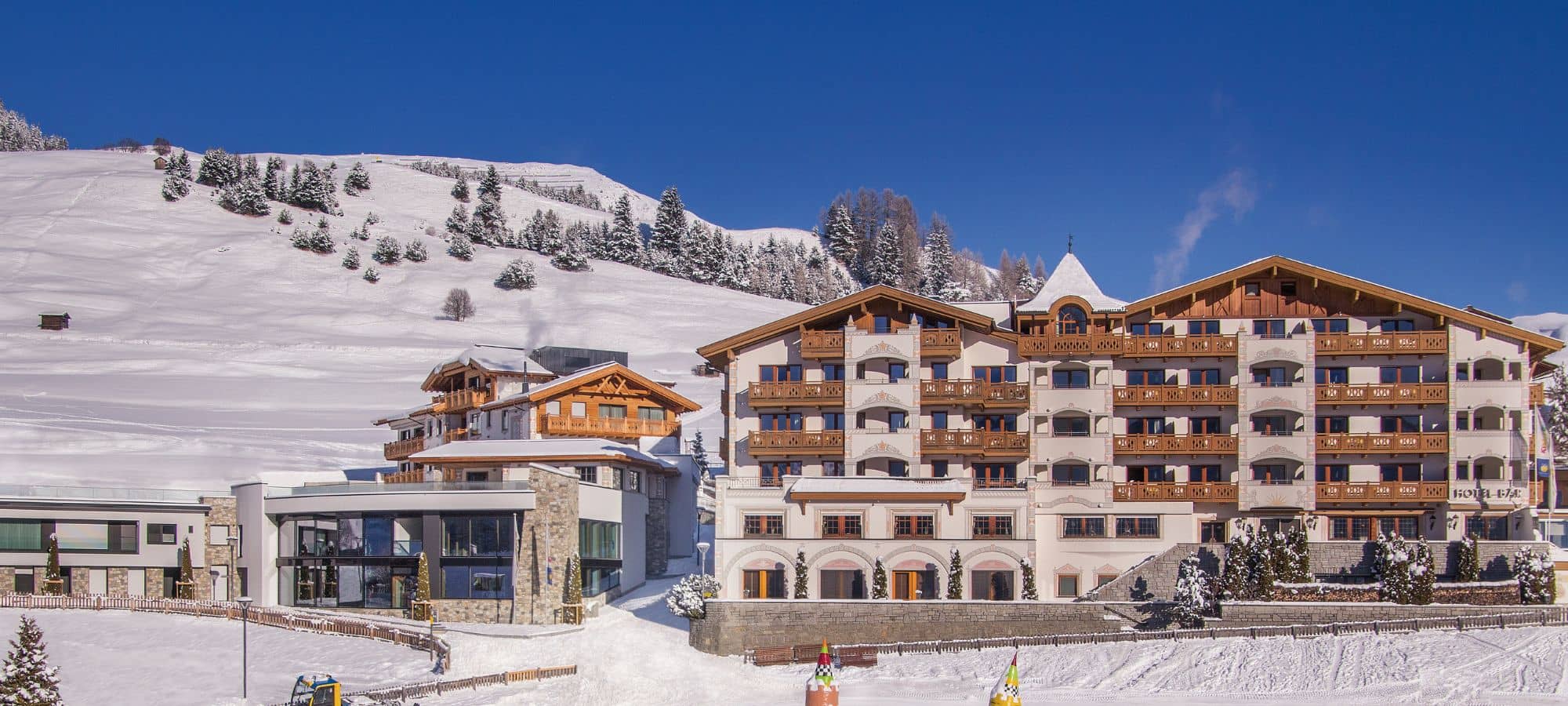 Ski-in, ski-out resort exterior with direct access to groomed slopes