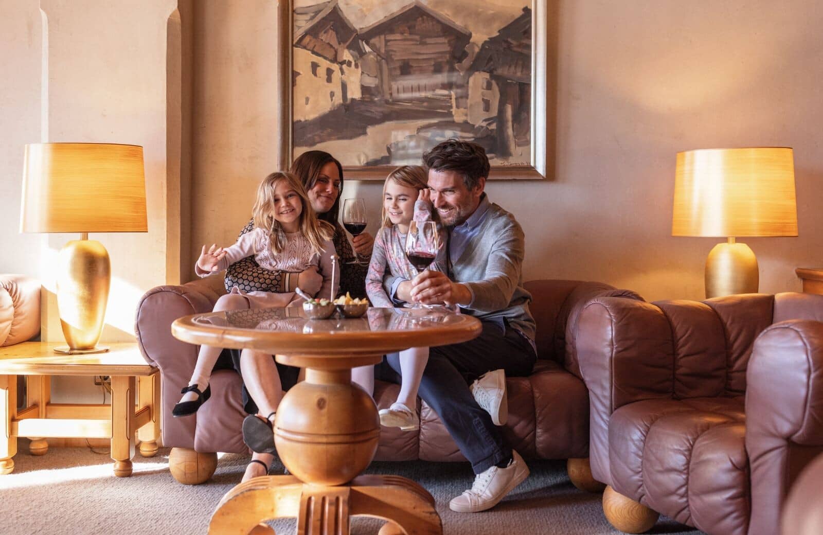 Lounge area with leather seating and hand-carved wood coffee table