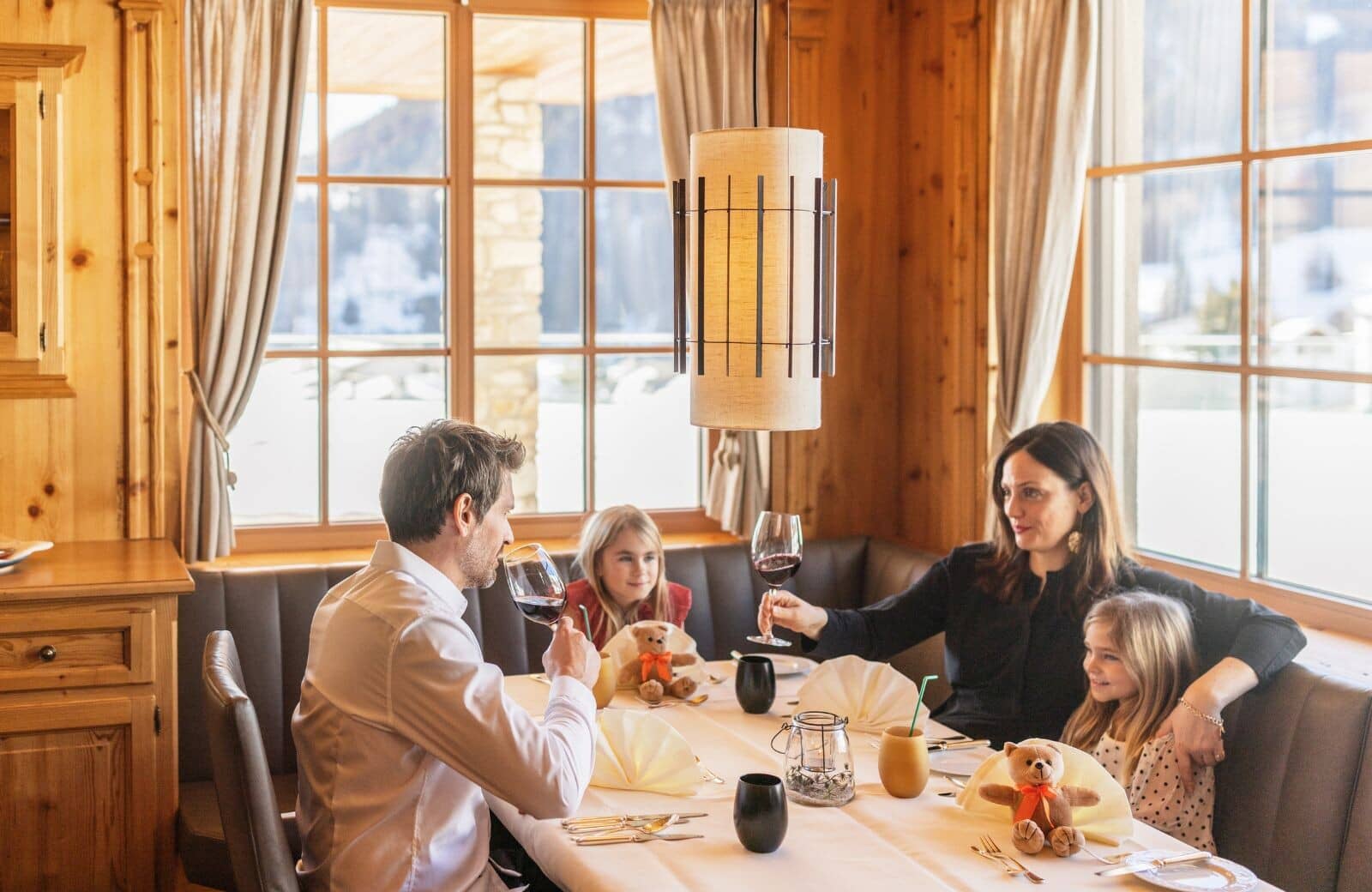 Dining nook with banquette seating and mountain views