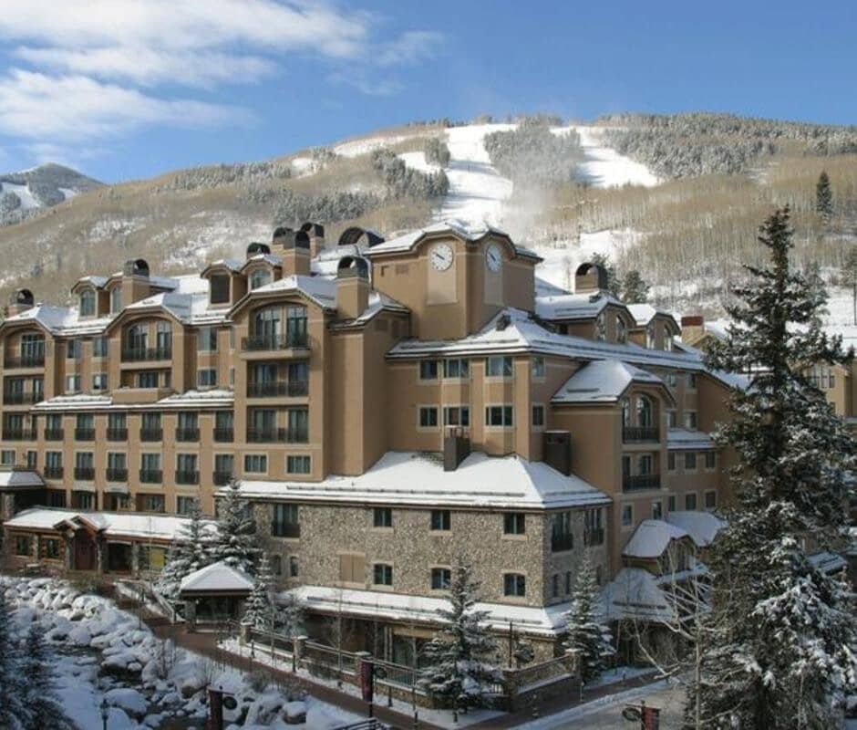 Ski-in, ski-out resort exterior at the base of groomed mountain runs