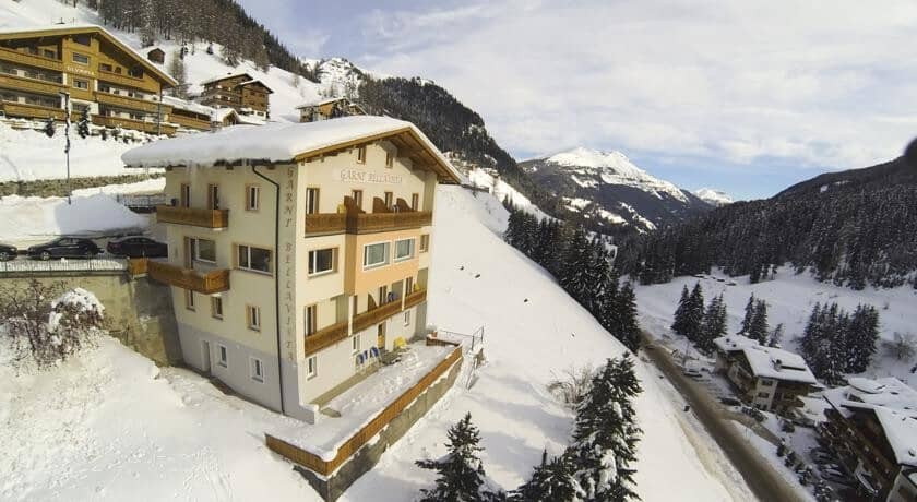 Slope-side lodge with private balconies and valley views