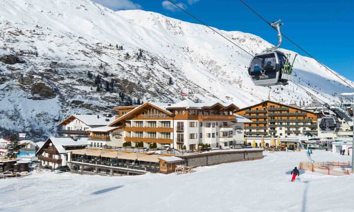 Ski-in/ski-out chalet access with gondola station and mountain views