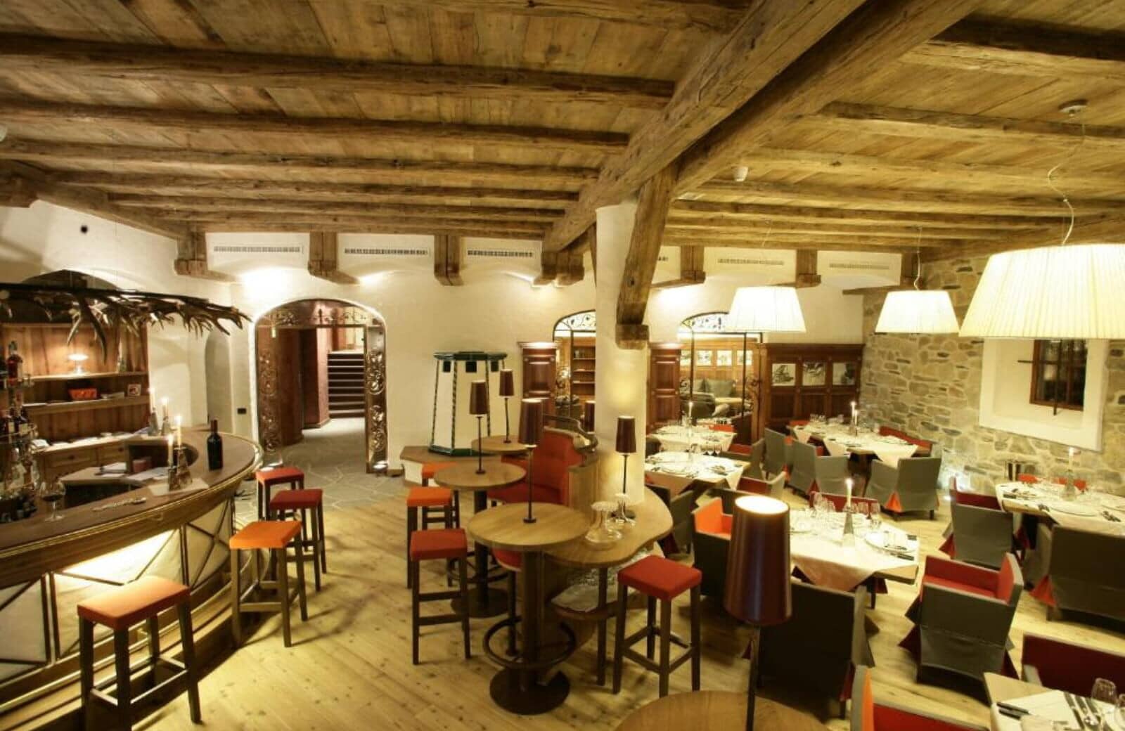Dining room with curved bar and exposed timber ceiling