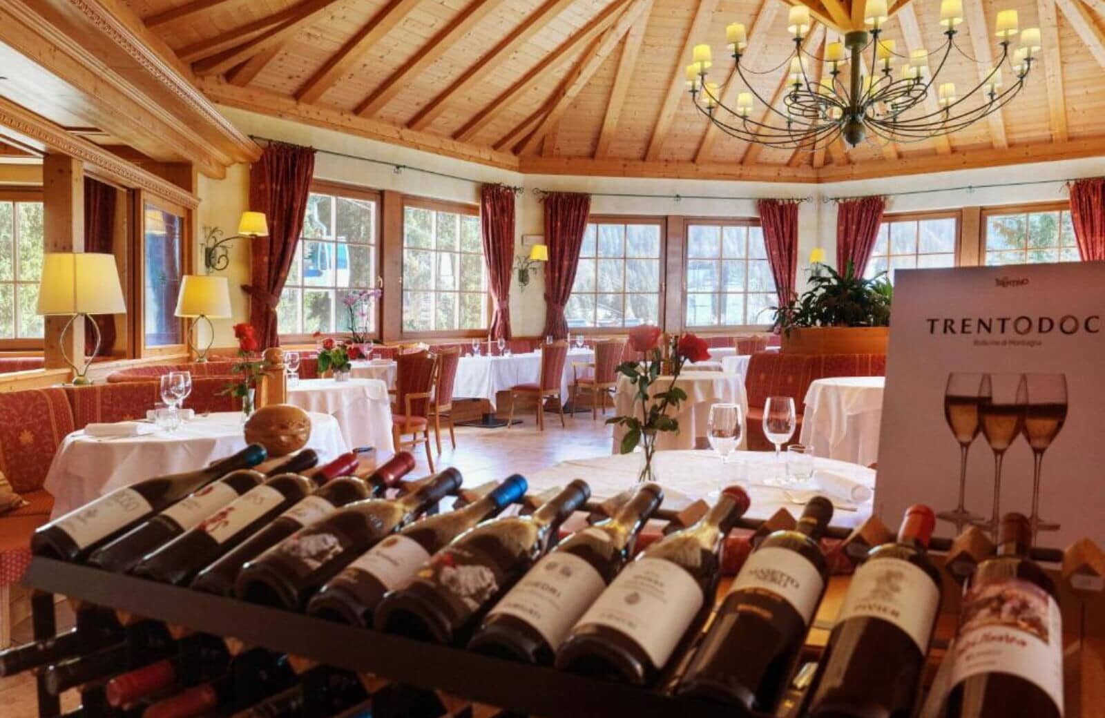 Dining room with vaulted wood ceiling and views of the ski gondola
