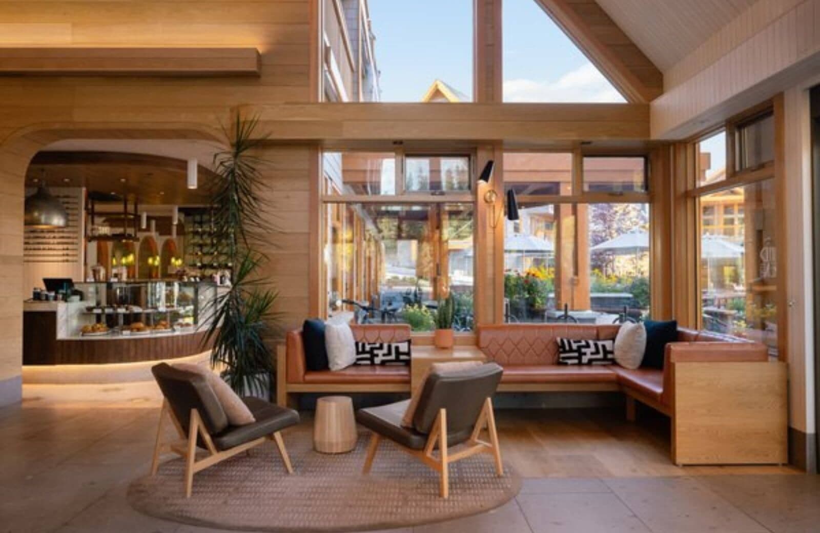 Lobby lounge with banquet seating and adjacent coffee bar