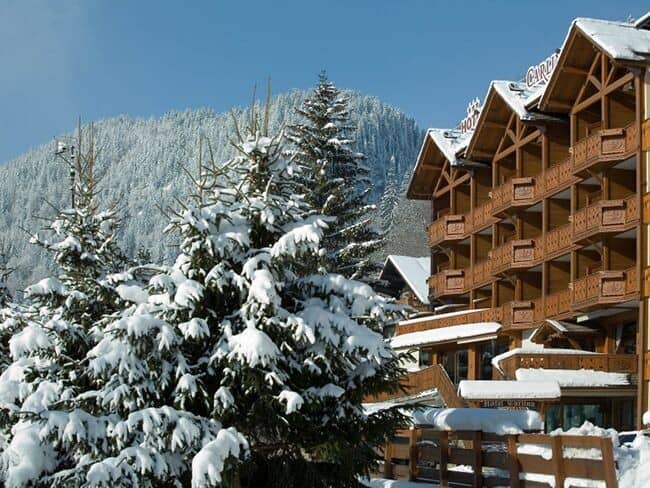 Chalet exterior with private balconies and mountain views