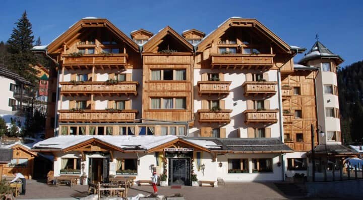 Chalet exterior with timber balconies and mountain resort access