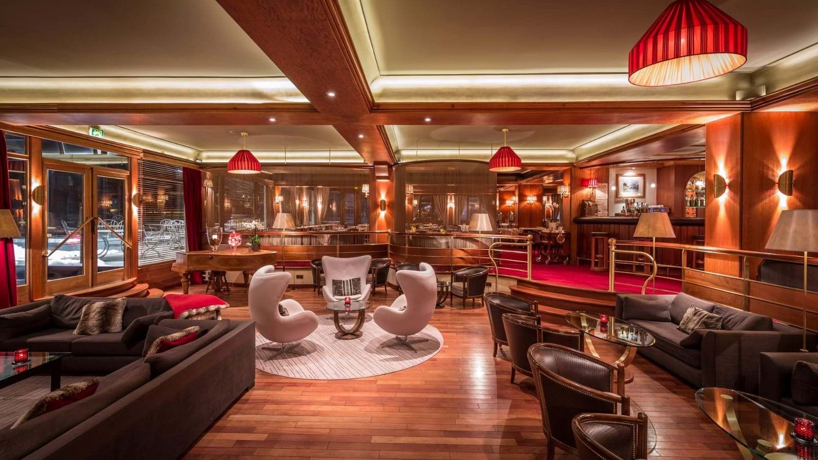 Shared lounge with grand piano and full service bar