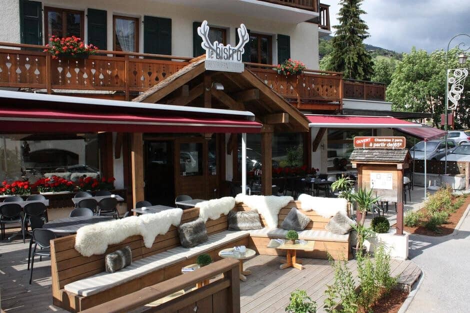 Building exterior with on-site restaurant and heated terrace seating