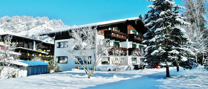 Chalet exterior with private balconies and mountain views