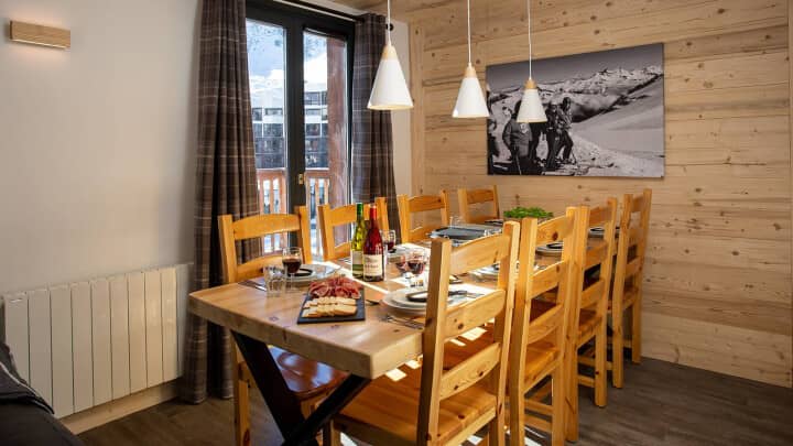 Dining area with seating for 8 and balcony access