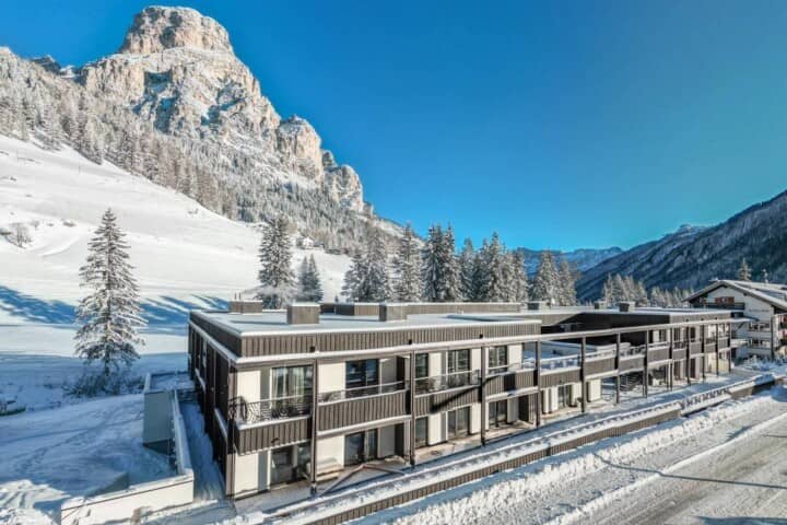 Ski-in/ski-out chalet with private balconies and mountain peak views