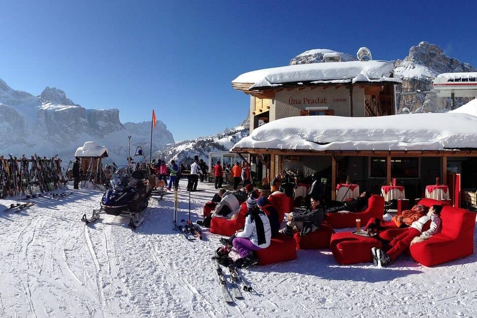 Ski-in lodge terrace with beanbag seating and mountain views