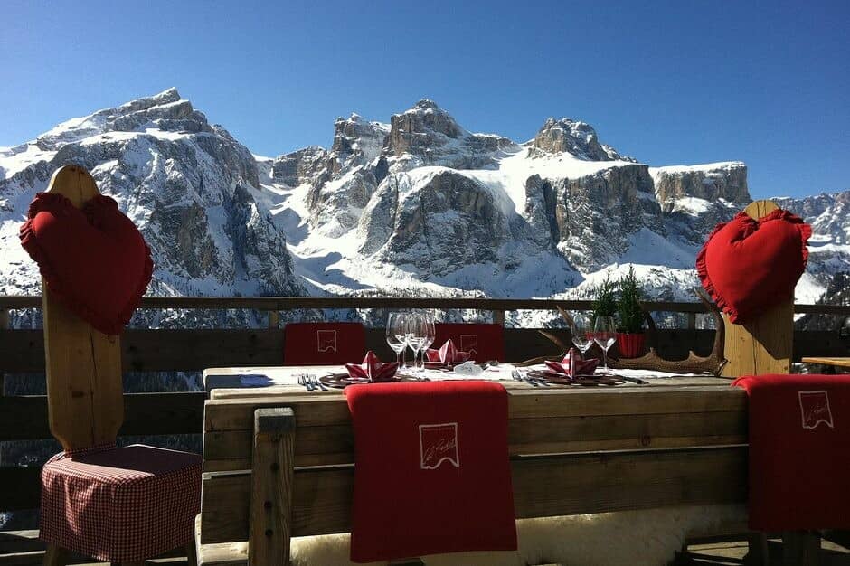 Outdoor dining table with seating for 4 and mountain views