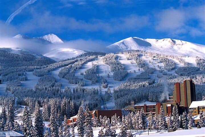 Mountain views with groomed ski runs and base area buildings