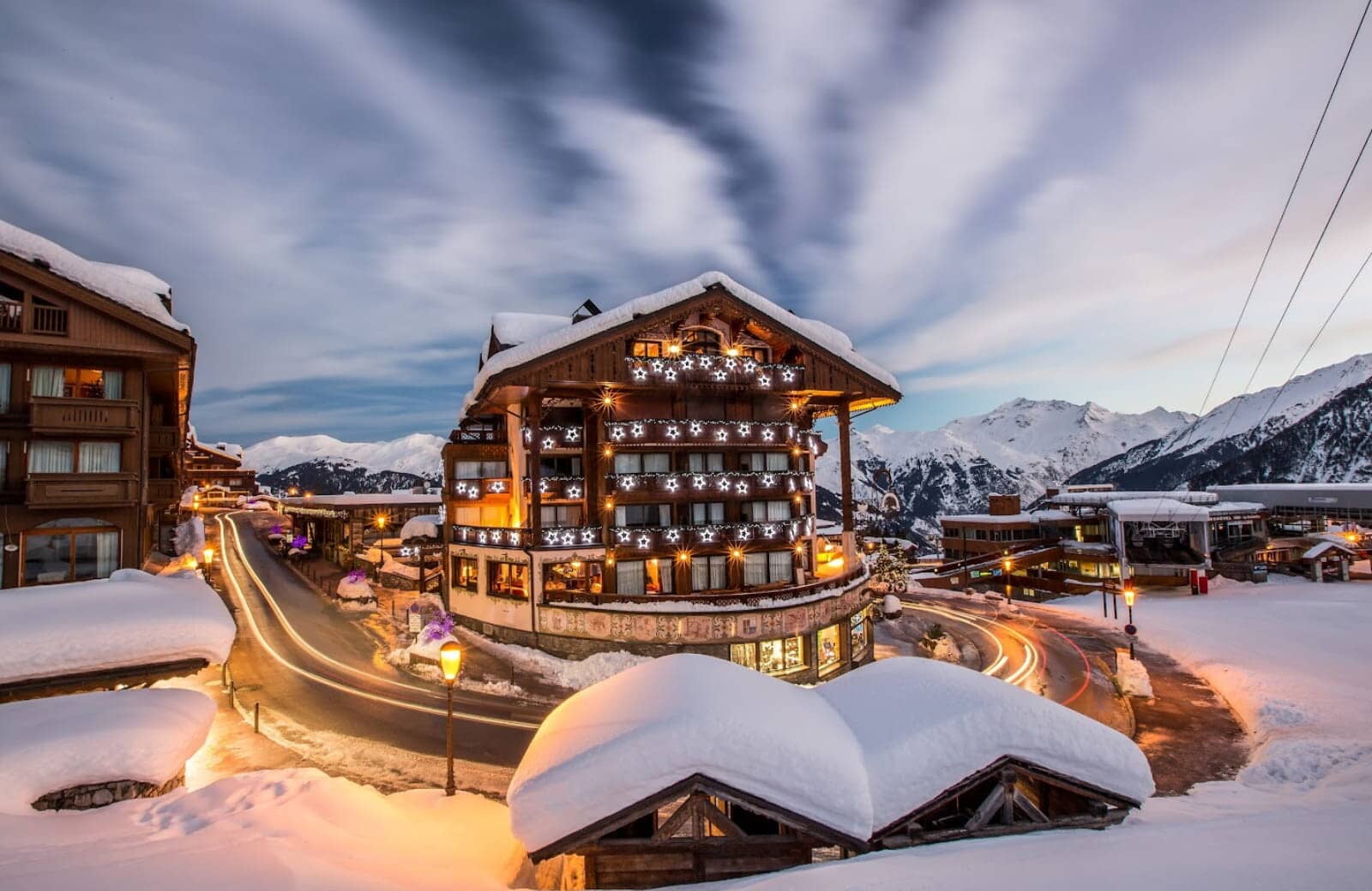 Ski-in/ski-out chalet exterior with private balconies and mountain views