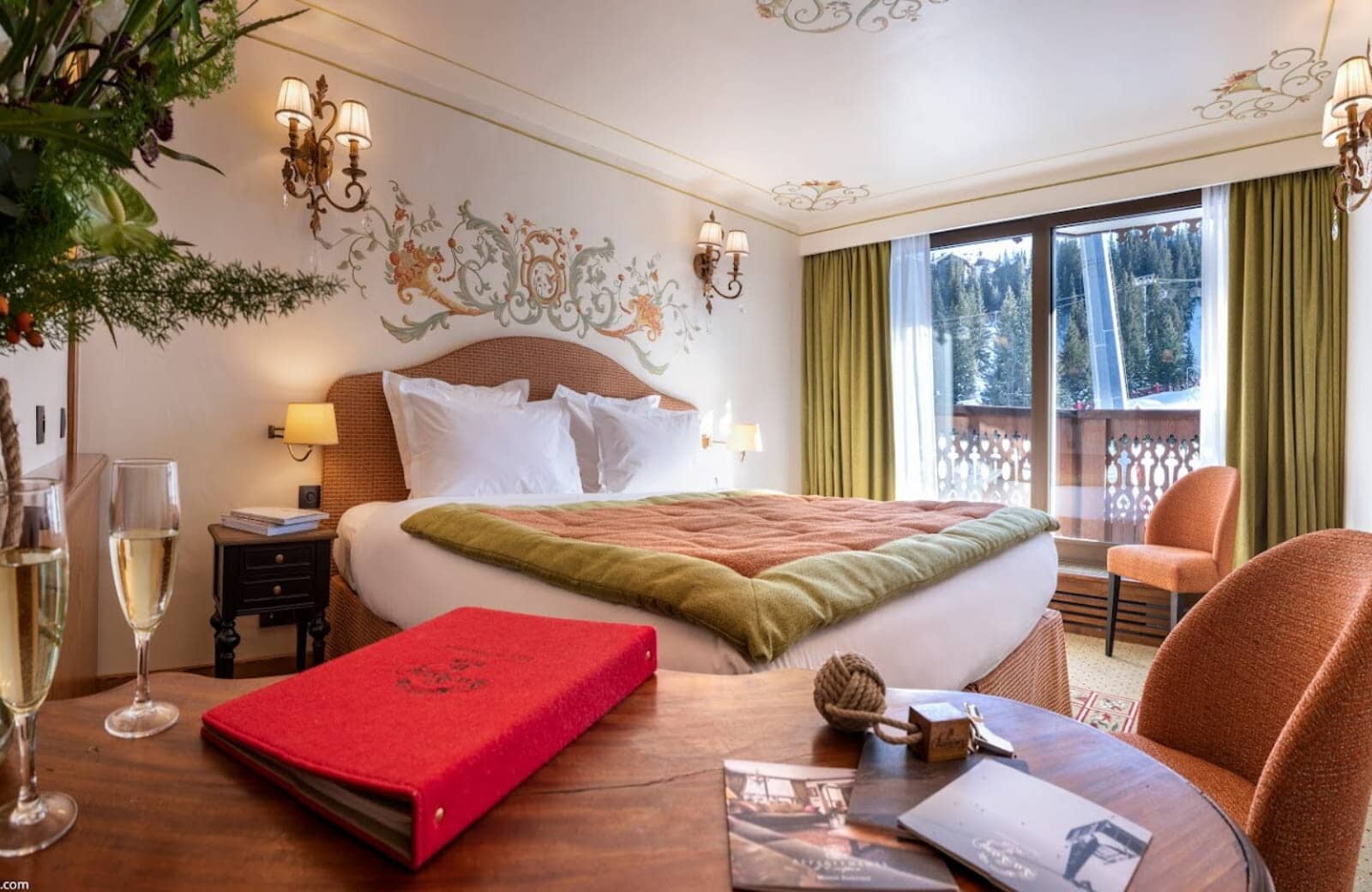 Primary bedroom with king bed and ski slope views