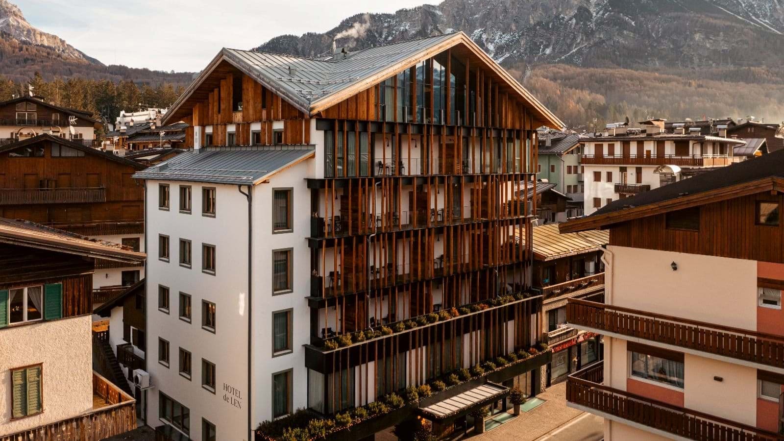 Alpine exterior with wood privacy slats and mountain views