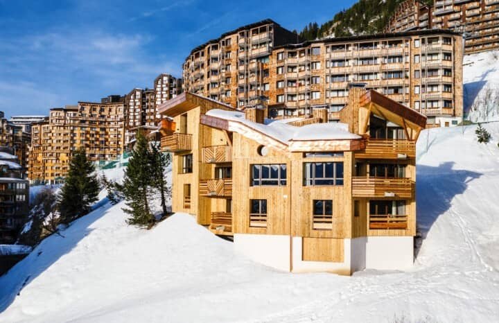 Ski-in, ski-out timber chalet with private balconies and mountain views