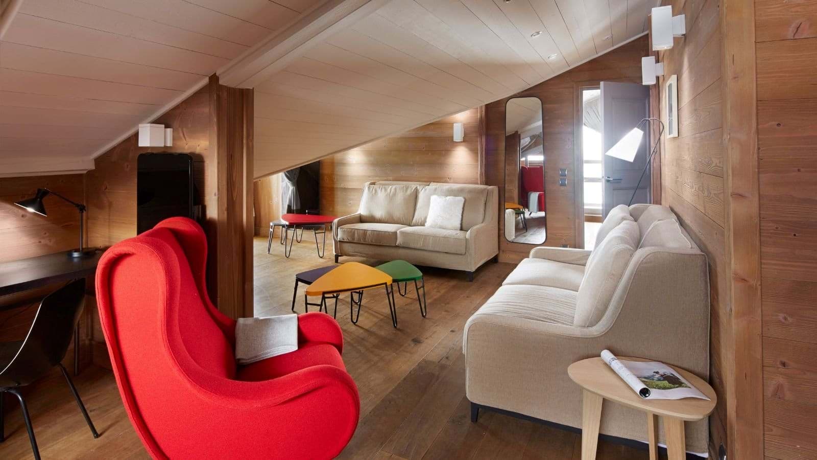 Living area with seating for five and integrated desk