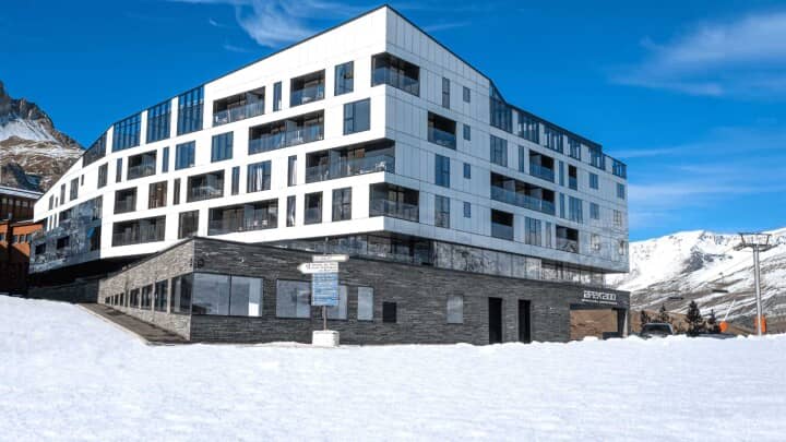 Ski-in/ski-out lodge exterior located directly on the mountain slopes
