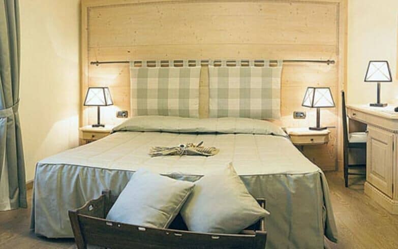 Guest bedroom with king bed and dedicated workspace