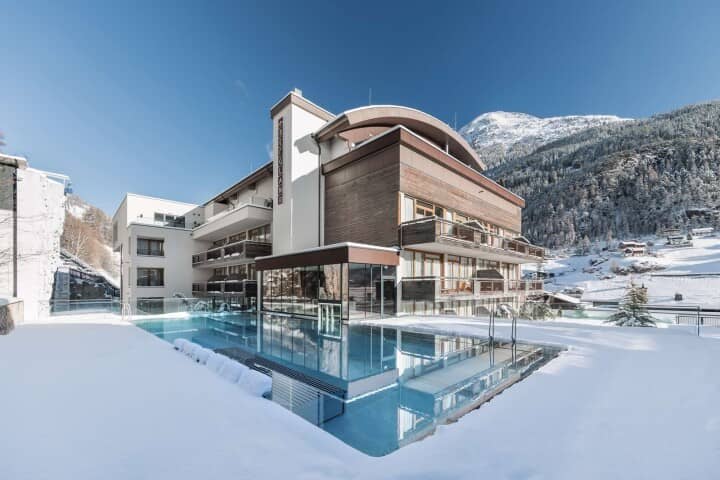 Heated outdoor pool with panoramic mountain views