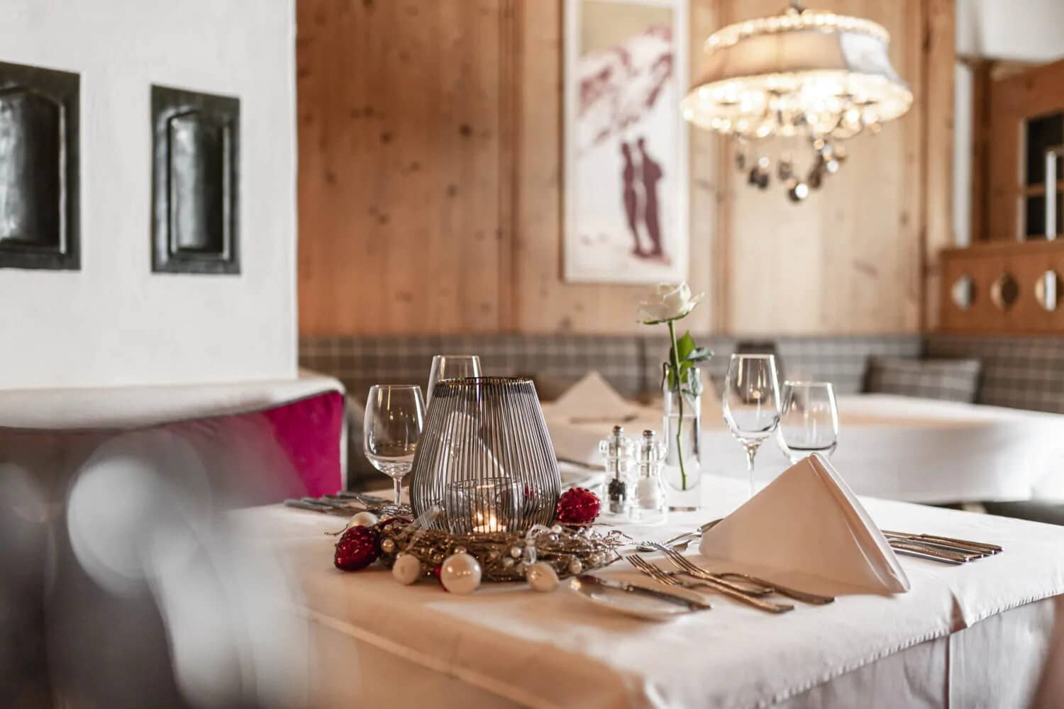 Dining area with booth seating and traditional wood paneling