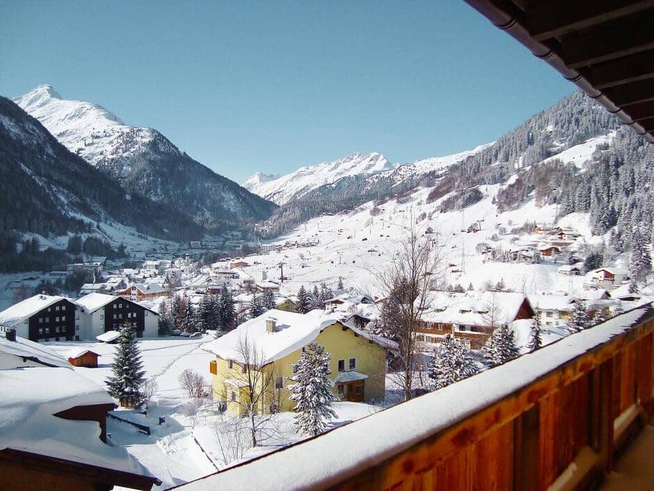 Private balcony view of village and surrounding ski slopes