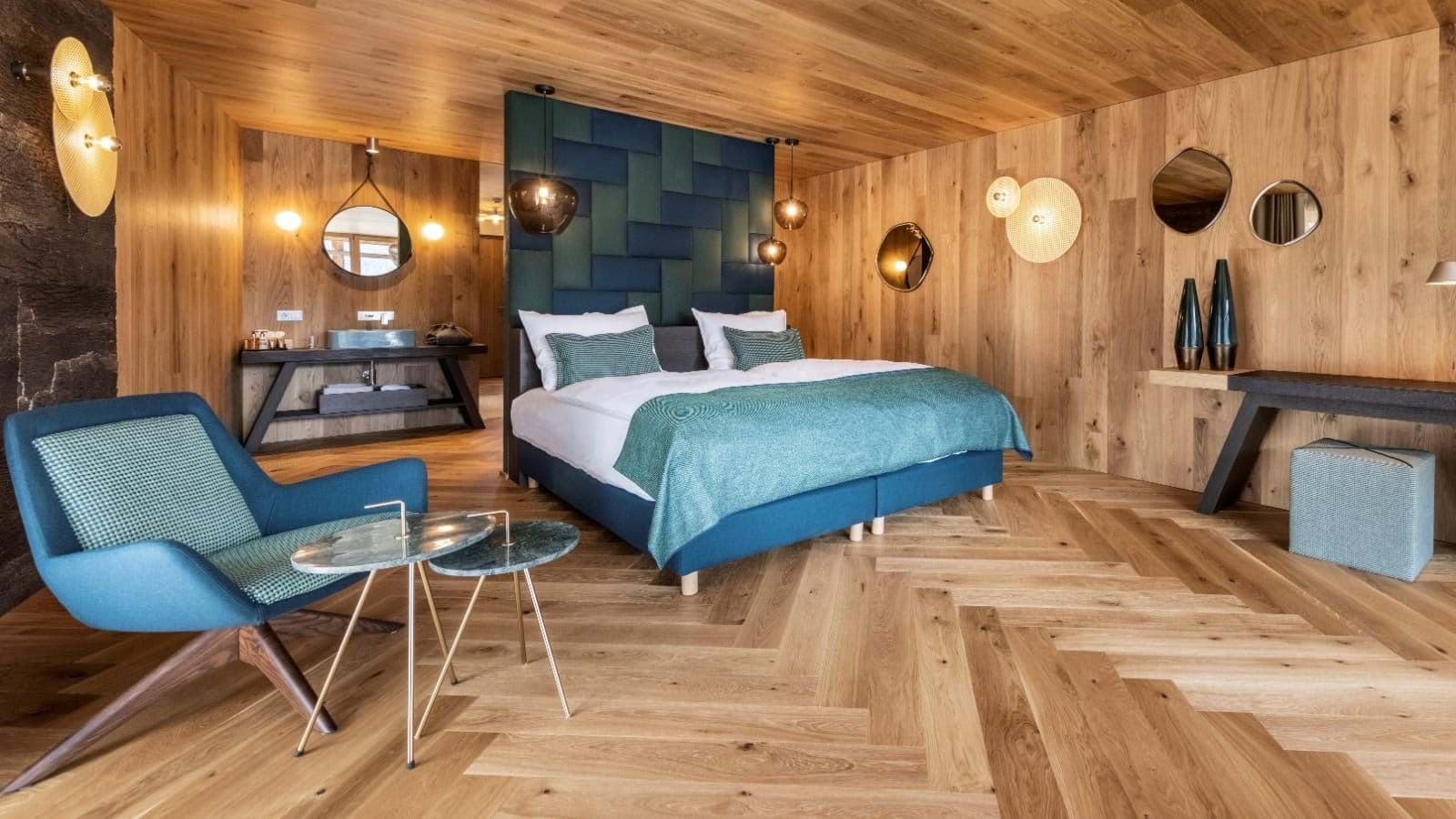 Primary bedroom with king bed and integrated open-concept vanity