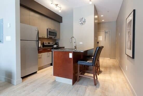 Kitchen with full-size appliances and island seating for 2