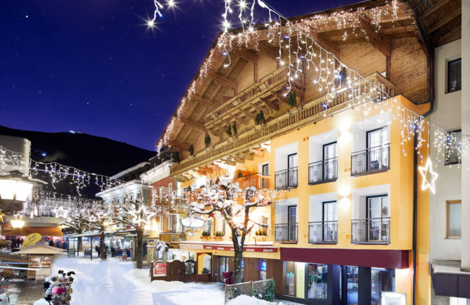 Chalet exterior featuring private balconies and pedestrian-only snow street access