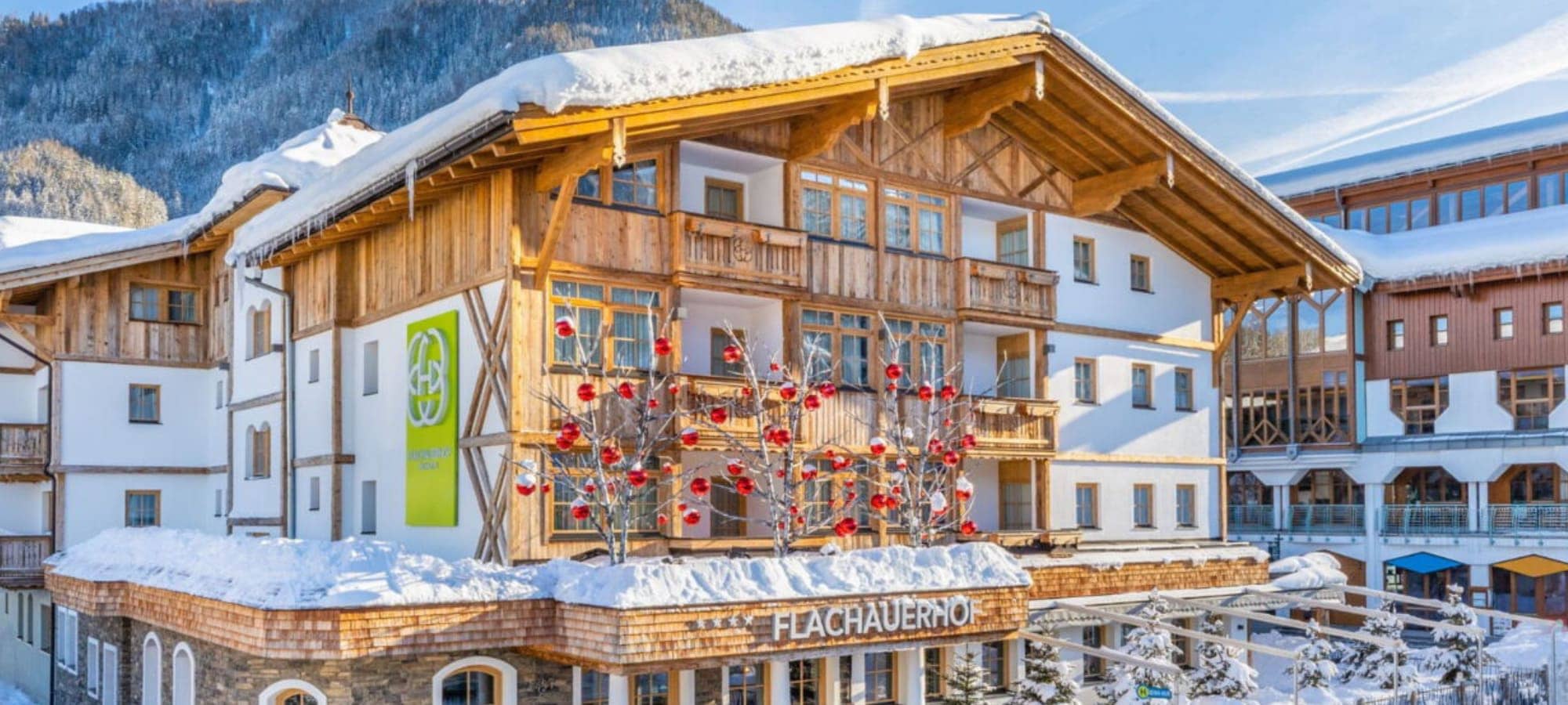 Chalet exterior with private balconies and mountain views