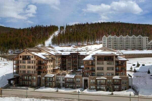 Ski-in/ski-out lodge exterior with direct access to mountain trails