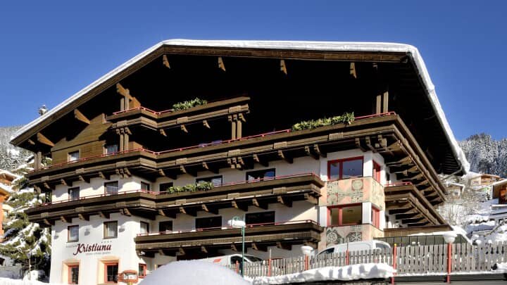 Chalet exterior featuring private balconies and traditional timber architecture