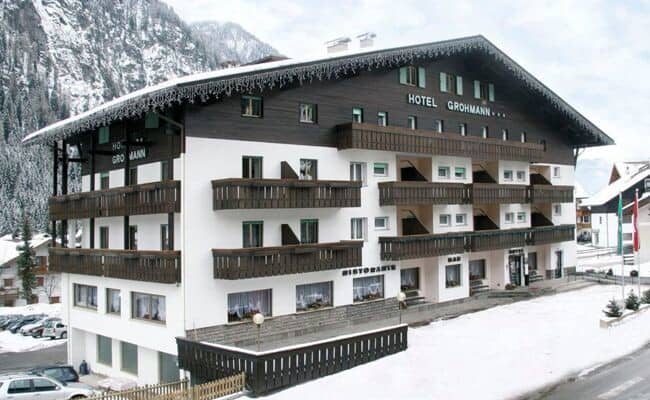 Alpine lodge with private balconies and mountain views