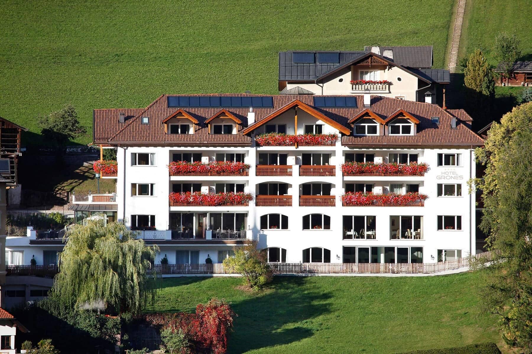 Chalet exterior with private balconies and solar panels