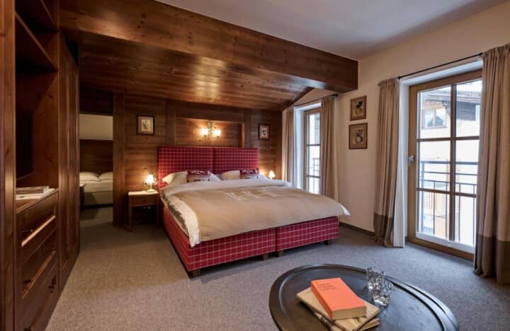 Primary bedroom with king bed and private balcony access