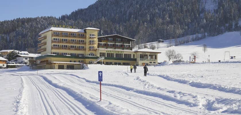 Ski-in/ski-out hotel exterior with direct access to groomed cross-country trails