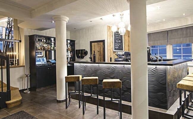 Lower level bar with espresso machine and seating for 7