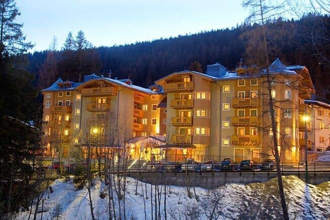 Ski-in/ski-out resort exterior with private balconies and on-site parking