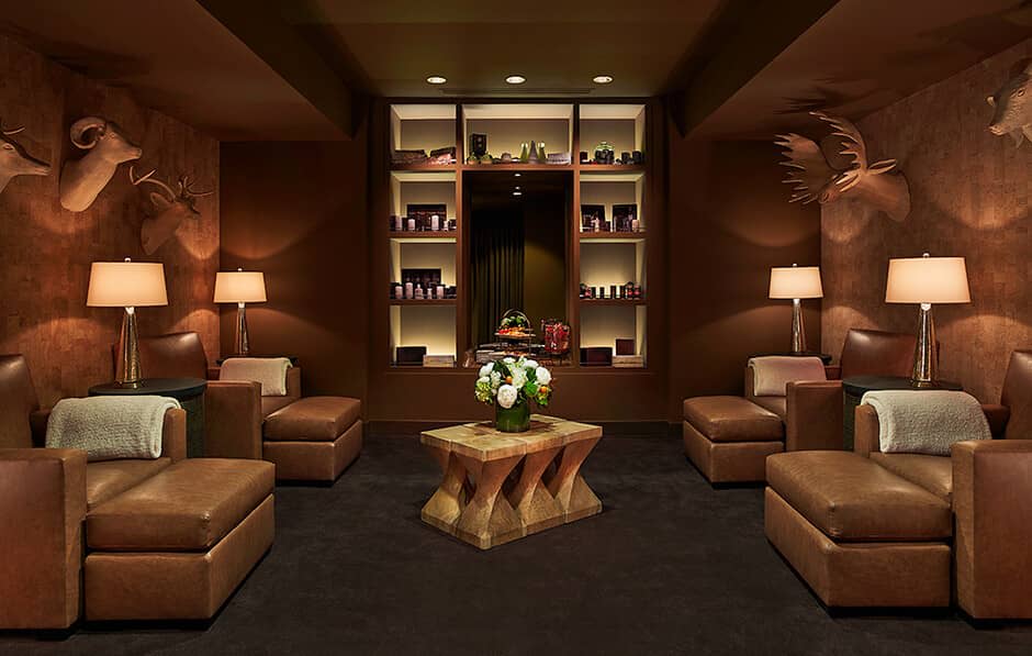 Lounge area with leather chaise seating and integrated refreshment bar