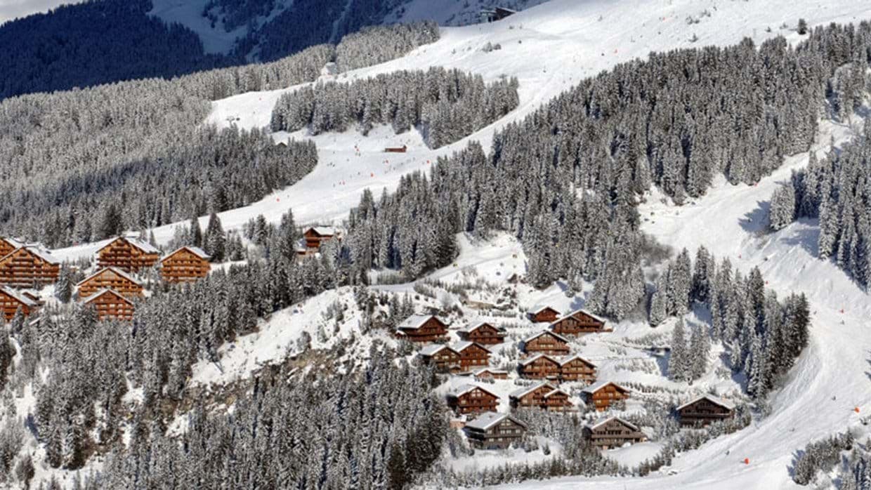 Ski-in, ski-out access via groomed runs bordering the chalet village