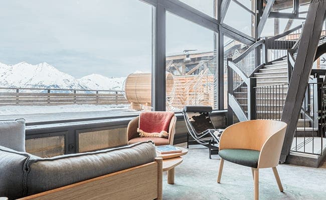 Lounge area with mountain views and outdoor barrel sauna